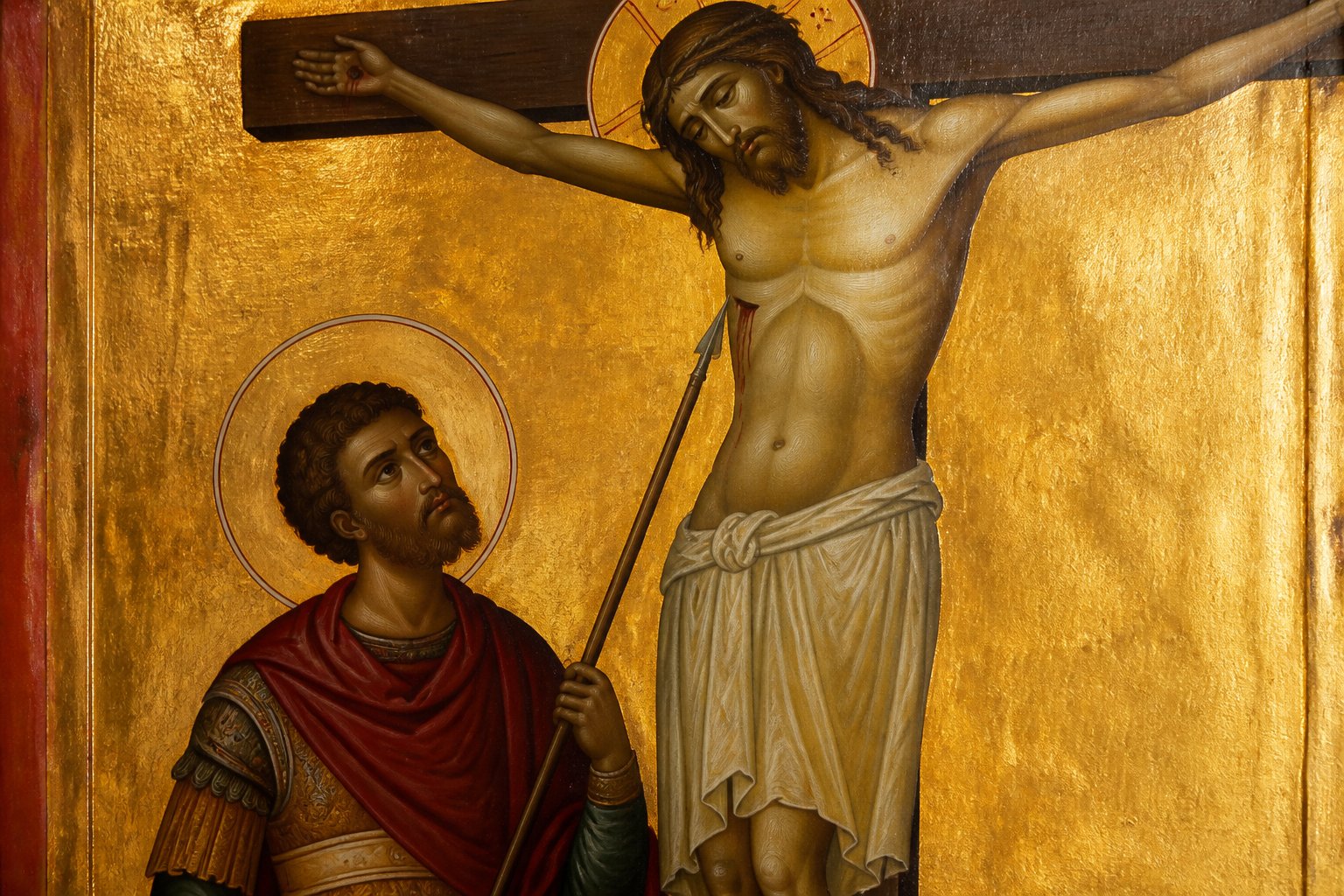 Icoană ortodoxă bizantină a Sfântului Longhin cu lancea la picioarele crucii.
